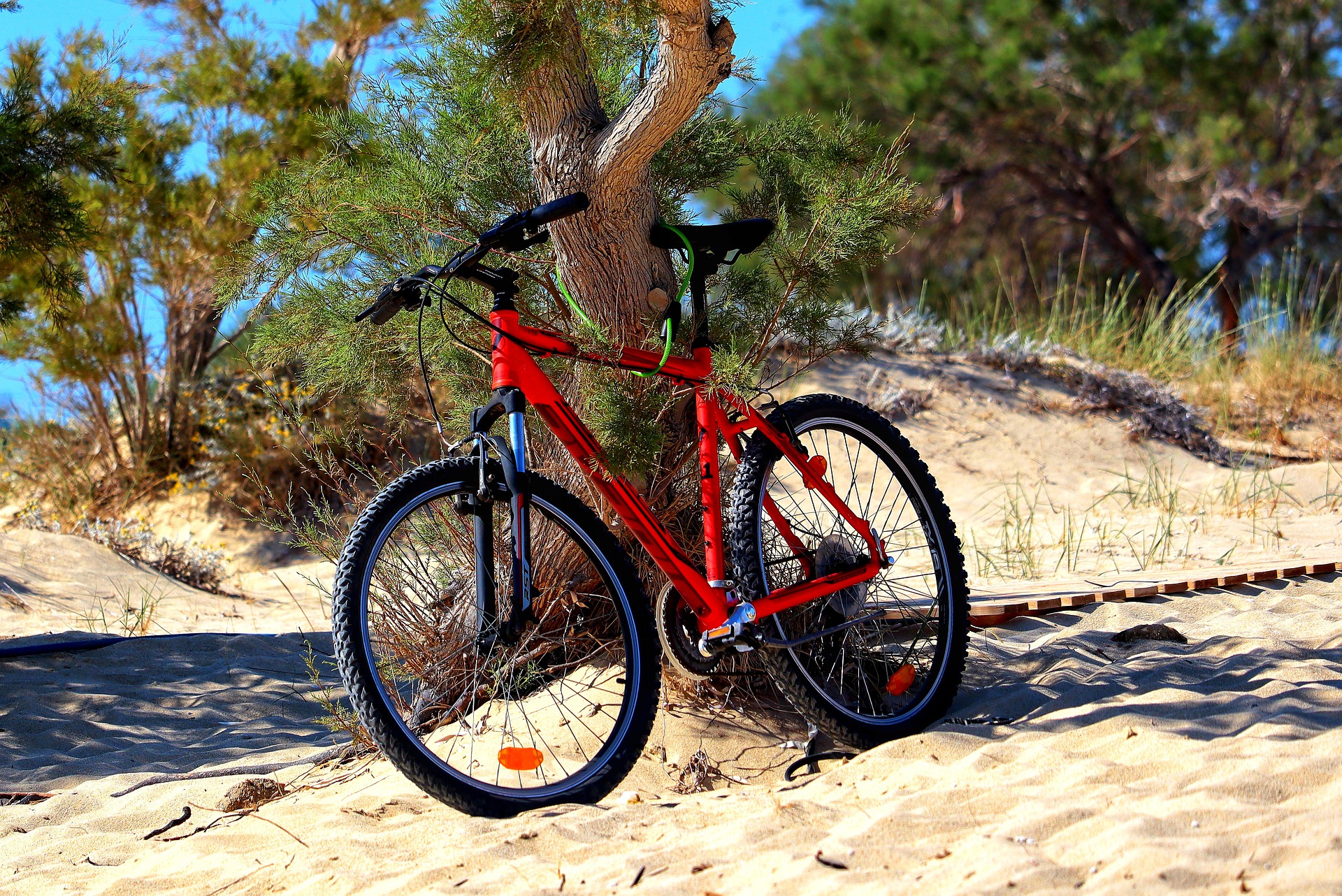 A picture of a bike on a beach