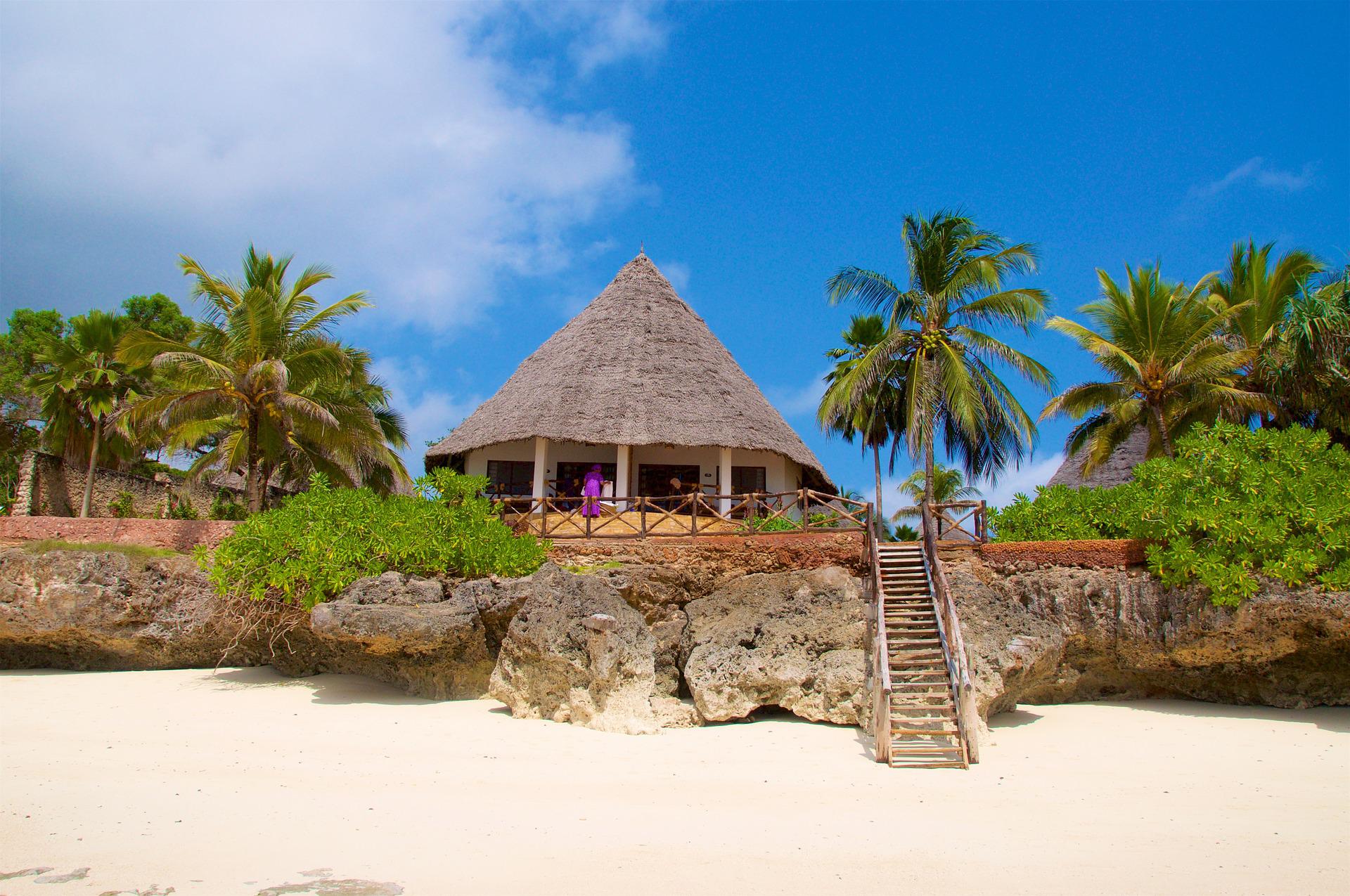 A shack style hotel on a beach